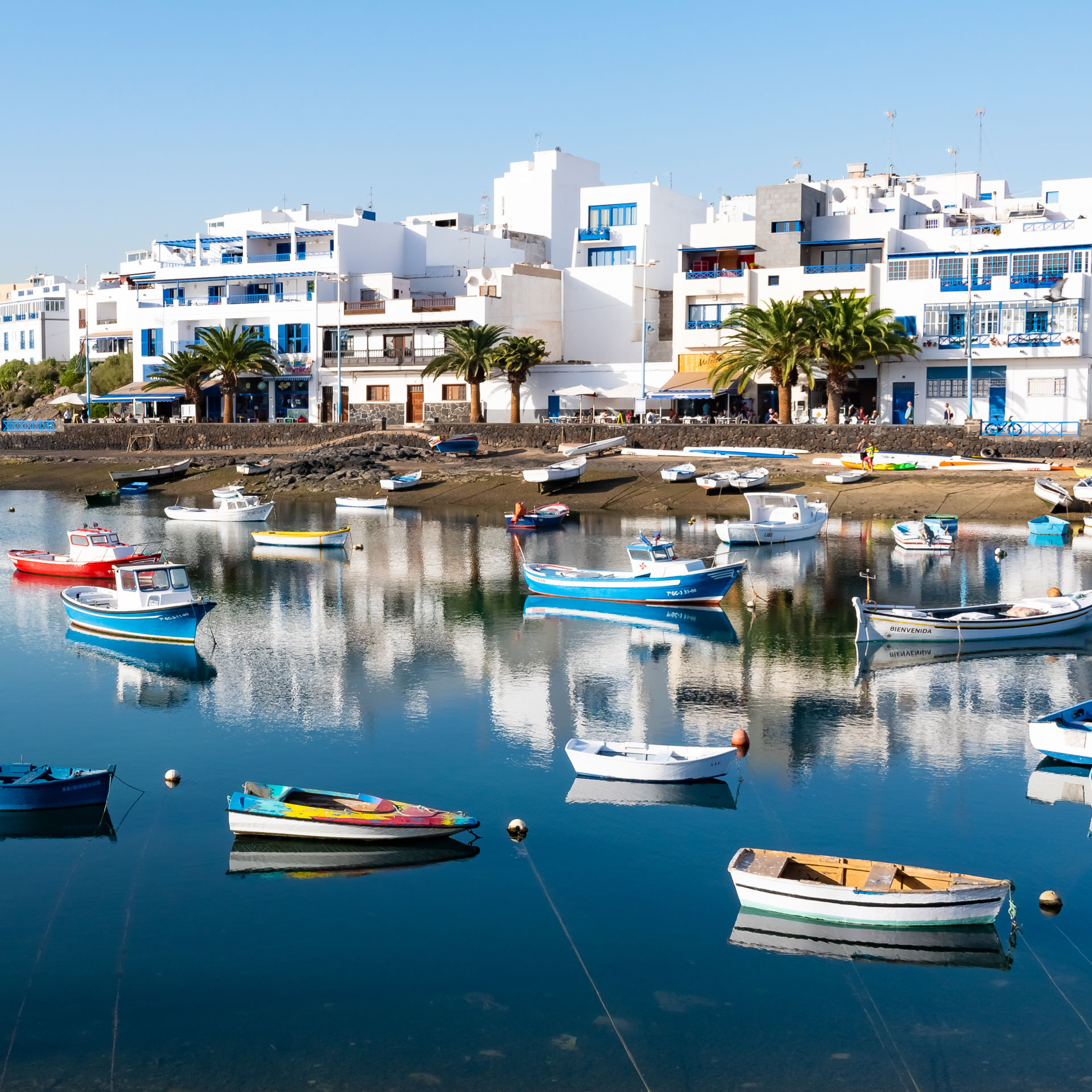 Charco de San Ginés lagoon with boats and restaurants